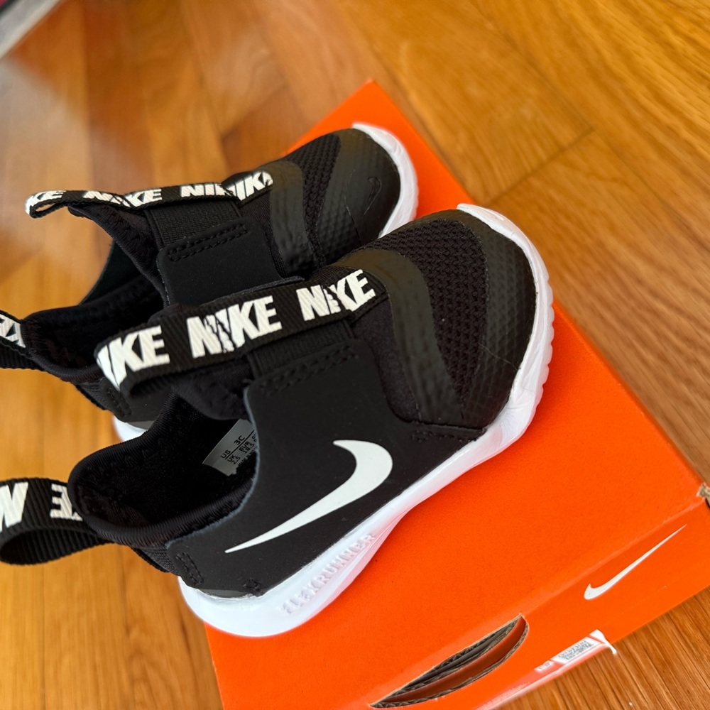 Nike Kids Black Sneakers with White Accents